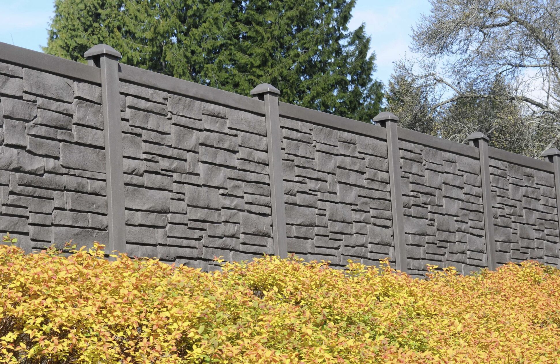 Weather-resistant gray stone vinyl fence in Alexander City, AL